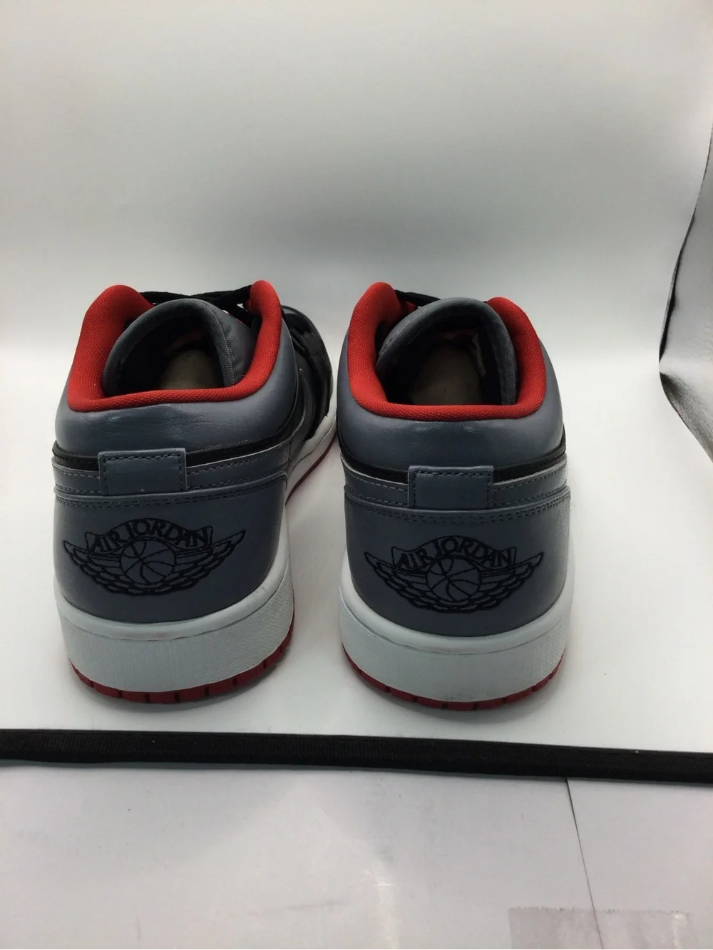 Jordan Low Top Sneakers in Black, Gray and Red